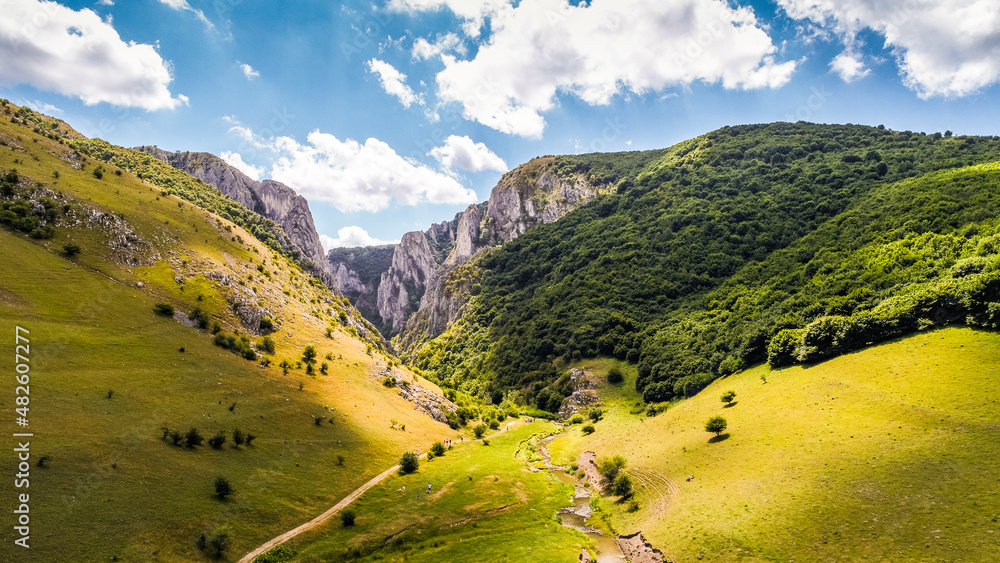 Aerial view over Turda Gorges - Cheile Turzii next to Cluj-Napoca in Romania during a summer day. Amazing mountain landscape.