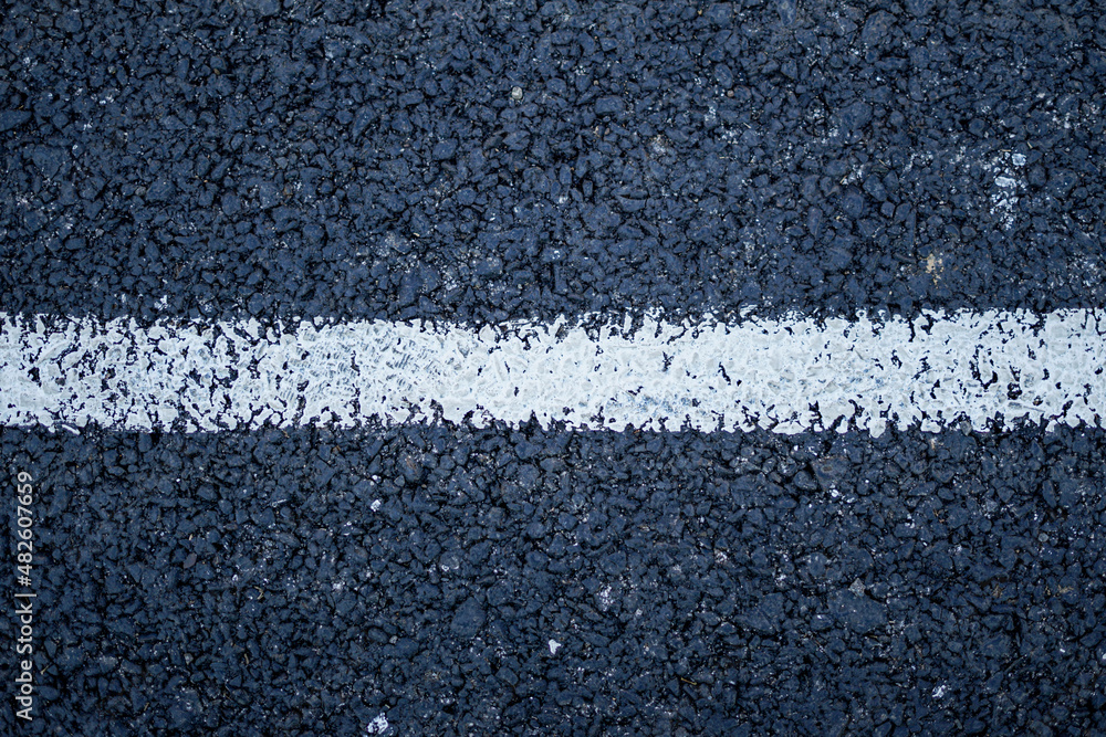 Fototapeta premium New asphalt road surface with white line