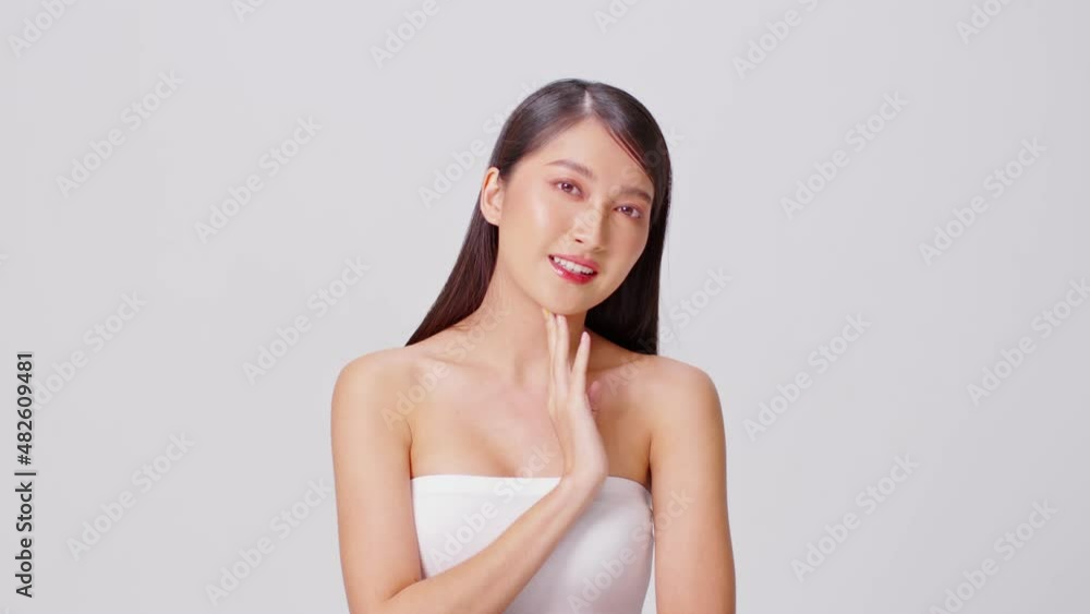Beautiful Asian young woman touching chin smile with clean and fresh skin Happiness and cheerful with positive emotional,isolated on white background,Beauty Cosmetics and spa Facial treatment Concept Beautiful Asian young woman touching chin smile with clean and fresh skin Happiness and cheerful with positive emotional,isolated on white background,Beauty Cosmetics and spa Facial treatment Concept