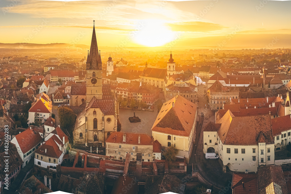Aerial view over Sibiu city in Transylvania, Romania, during an amazing sunset over the centre old town