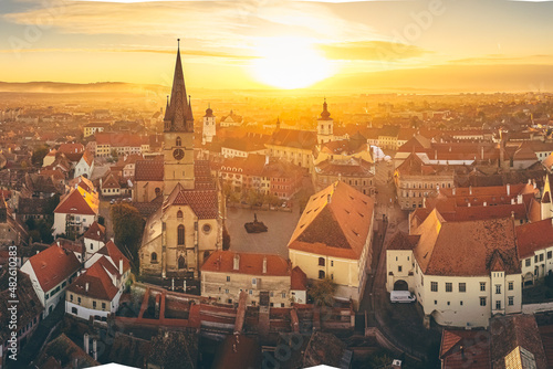 Aerial view over Sibiu city in Transylvania, Romania, during an amazing sunset over the centre old town photo