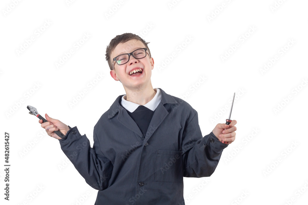 A teenage Caucasian boy with glasses in a black lab coat holds a wrench and a screwdriver in his hands. Isolate of a schoolboy on a white background A teenage Caucasian boy with glasses in a black lab coat holds a wrench and a screwdriver in his hands. Isolate of a schoolboy on a white background