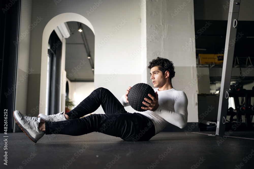 A man healthy lifestyle athlete does the right exercises cardio workout in the gym. Fitness concept A man healthy lifestyle athlete does the right exercises cardio workout in the gym. Fitness concept