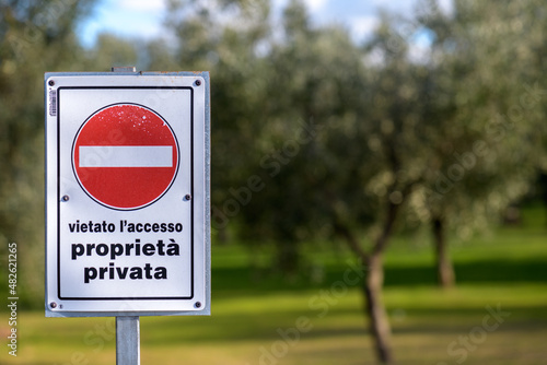 Stop sign NO ENTRY with the inscription private property no entry in italian, Private area information board