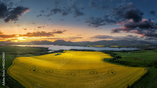 yellow field with crop circles near Liptovska Mara dam