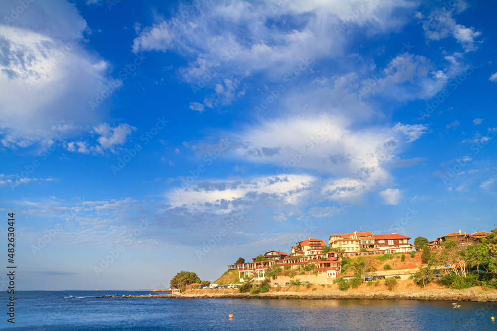 Seaside cityscape - view of the embankment with a cafe in the Old Town of Nesebar, on the Black Sea coast of Bulgaria