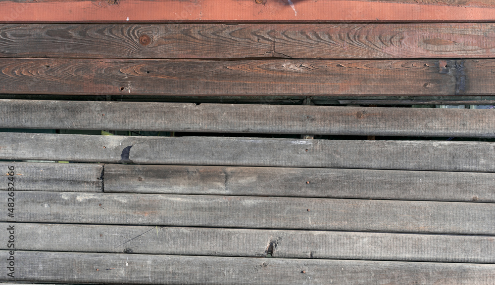 old wooden wall with faded red paint old wooden wall with faded red paint
