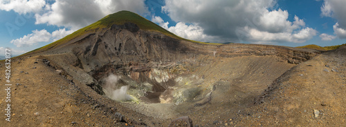 Panoramic view and natural landscape of the active crater of Lokon volcano, one of the twin volcanoes located in the Tondano plain near Tomohon, Minahasa Regency, North Sulawesi, Indonesia photo