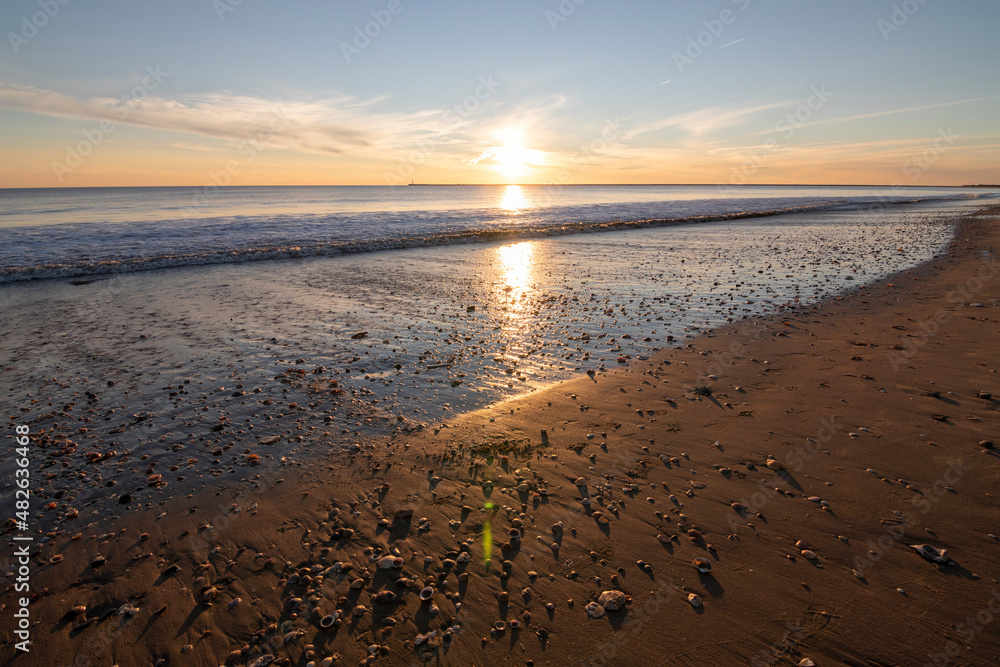 A sunset in one of the most beautiful beaches in Spain, Mazagon. Concept of the most beautiful beaches. A sunset in one of the most beautiful beaches in Spain, Mazagon. Concept of the most beautiful beaches.