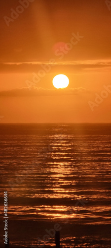 sunset over the sea © Caio
