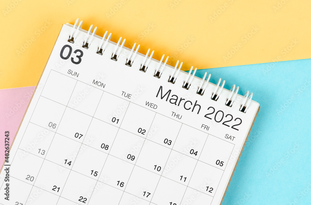 March 2022 desk calendar on multicolored background. March 2022 desk calendar on multicolored background.