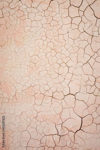 cracked plastered wall background, distressed painted surface texture, photography backdrop, empty full frame closeup