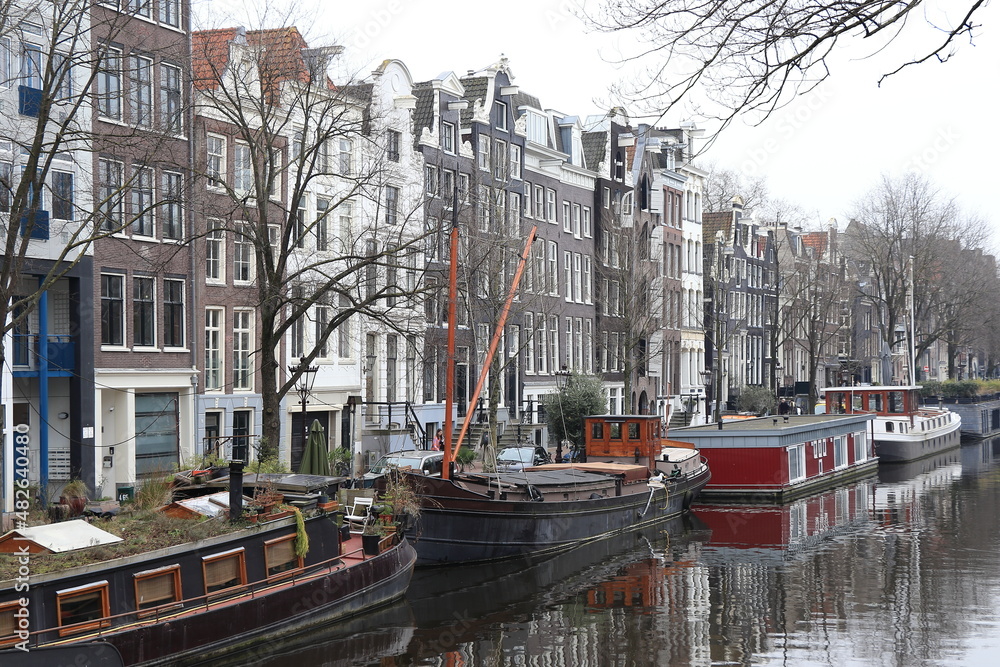 Amsterdam Canal View with Traditional Architecture and House Boats, Netherlands