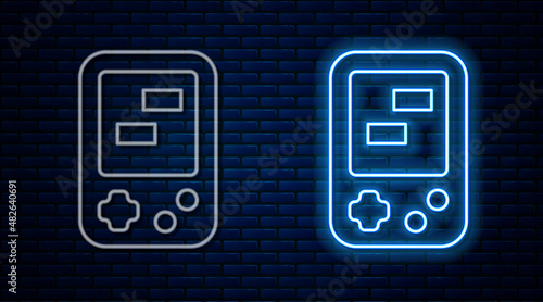 Glowing neon line Portable tetris electronic game icon isolated on brick wall background. Vintage style pocket brick game. Interactive playing device. Vector