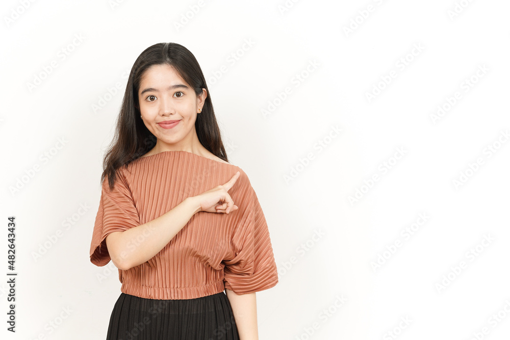 Pointing Product On The Side Of Beautiful Asian Woman Isolated On White Background Pointing Product On The Side Of Beautiful Asian Woman Isolated On White Background
