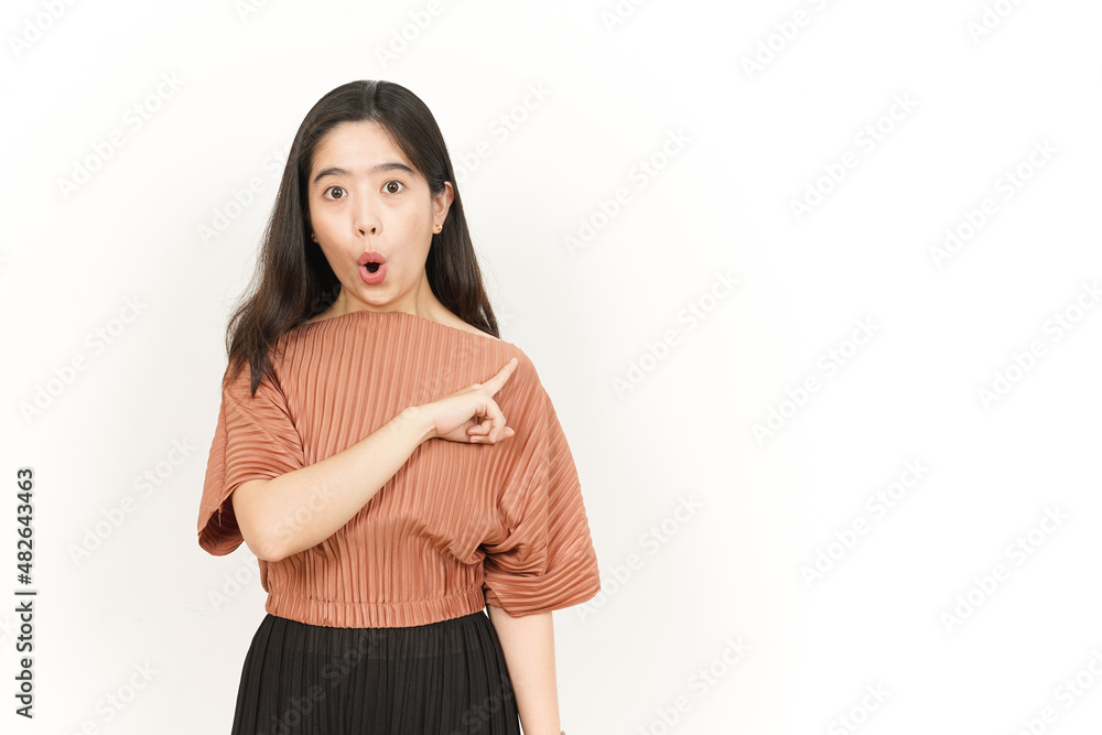 Pointing Product On The Side Of Beautiful Asian Woman Isolated On White Background