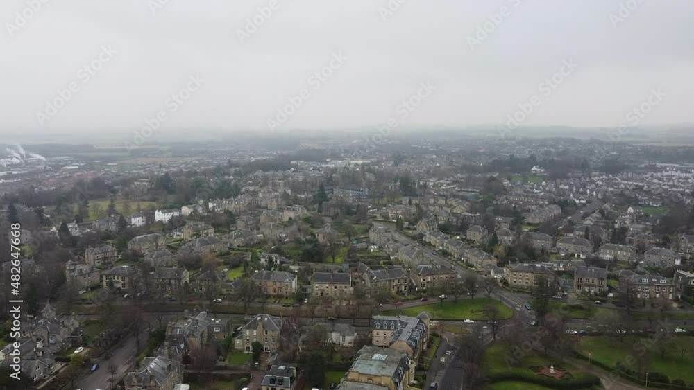 Flying over the City of Stirling in fog. Scotland. Stirling is a city in central Scotland, 26 miles northeast of Glasgow and 37 miles northwest of Edinburgh. Flying over the City of Stirling in fog. Scotland. Stirling is a city in central Scotland, 26 miles northeast of Glasgow and 37 miles northwest of Edinburgh.