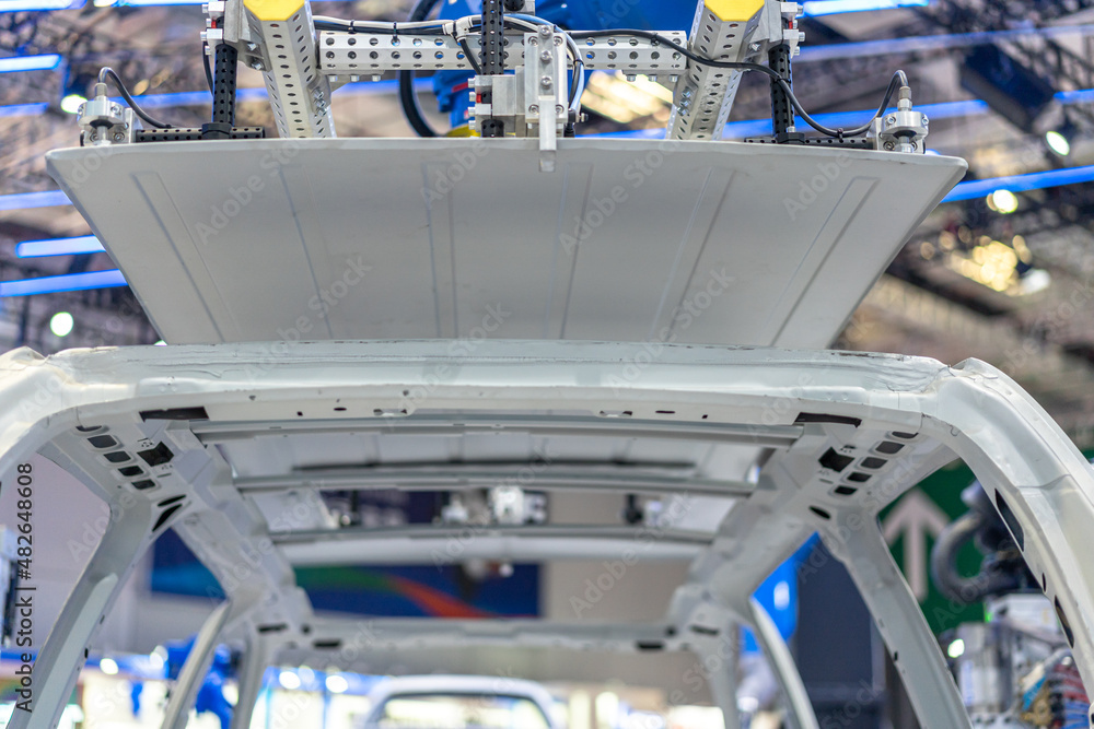 Robot arm working in car factory Robot arm working in car factory