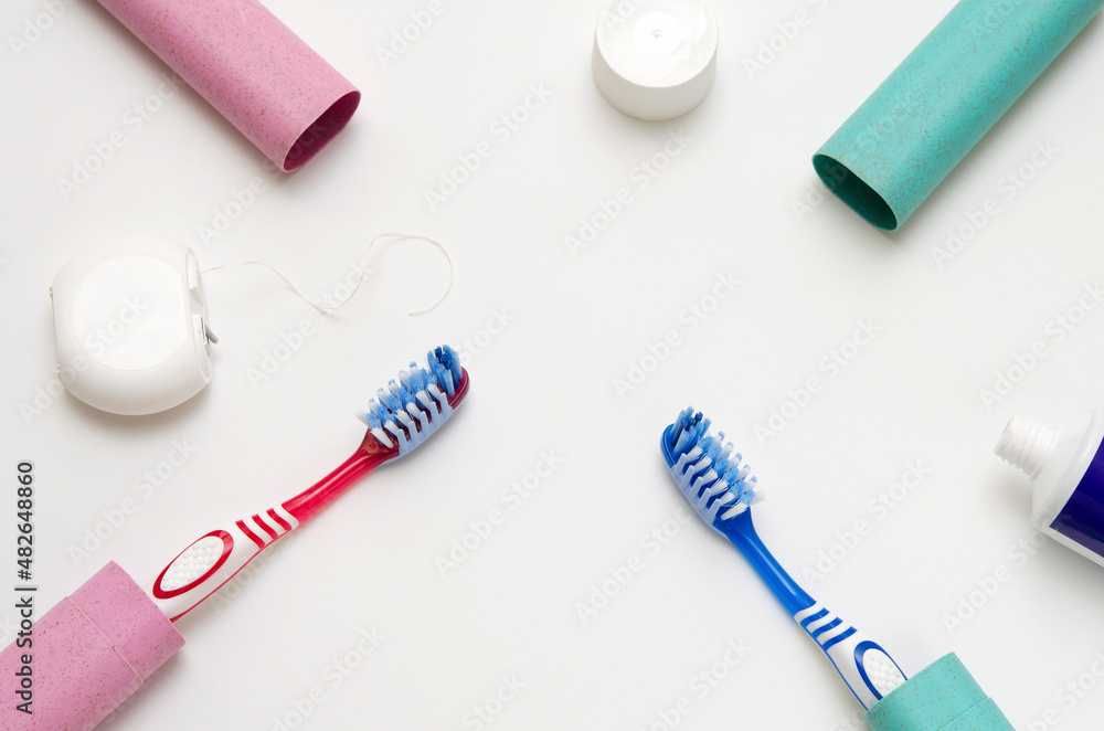 oral hygiene items toothbrushes, toothpaste, dental floss on white background oral hygiene items toothbrushes, toothpaste, dental floss on white background