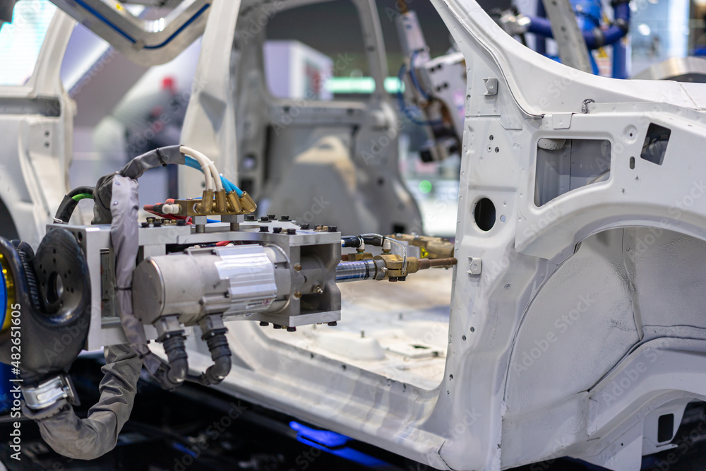 robot arm working in factory robot arm working in factory