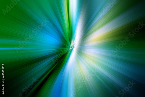 Abstract surface of radial blur zoom green, blue and yellow tones. Delicate green, blue background with radial, diverging, converging lines. 