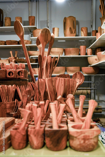Handmade kitchen utensils store in natural wood.