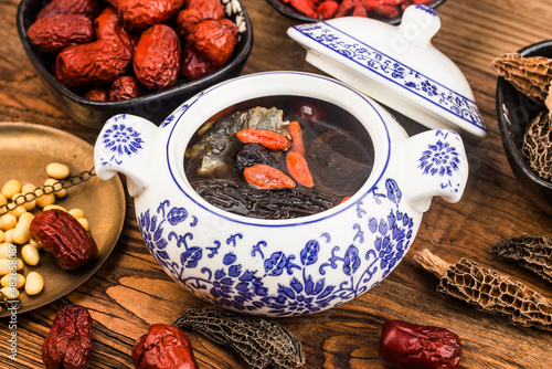 Chinese cuisine: morel and turtle stew soup photo