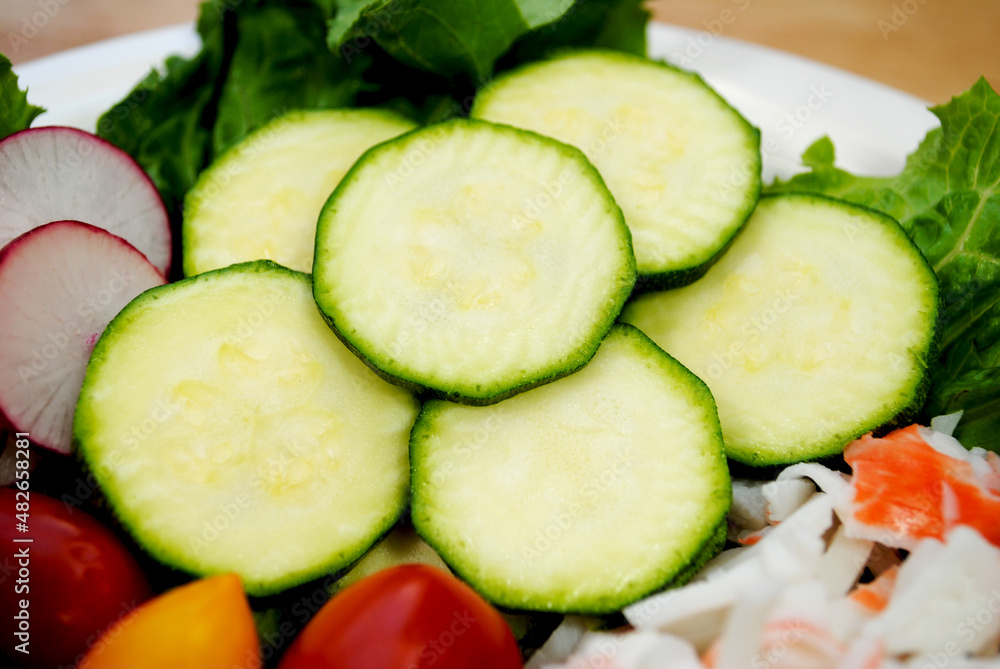 Close-up of Raw Zucchini as Part of a Raw Fresh Salad Close-up of Raw Zucchini as Part of a Raw Fresh Salad