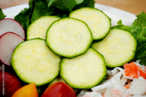Close-up of Raw Zucchini as Part of a Raw Fresh Salad