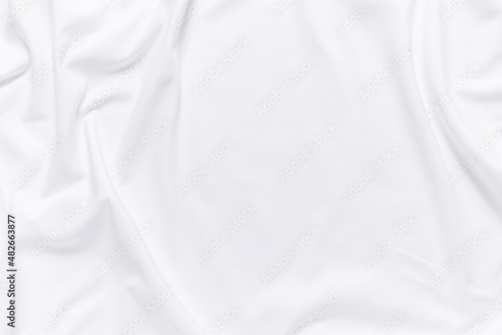 White fabric texture background. Cloth soft wave. Creases of satin, silk, and cotton.