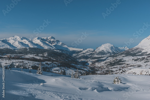 A picturesque landscape view of the French Alps mountains on a cold winter day (Hautes-Alpes, Devoluy valley) © k.dei
