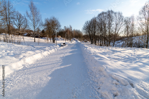 country landscape with snowy road in Russia