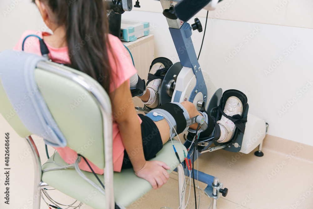 Patient on Continuous Passive Range of Motion machines. Device to ...