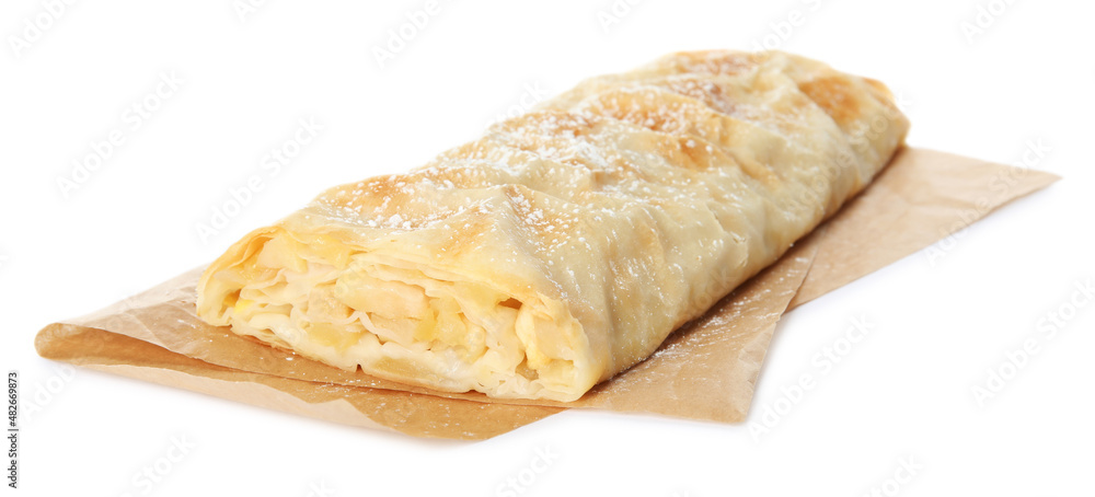 Delicious apple strudel with powdered sugar isolated on white Delicious apple strudel with powdered sugar isolated on white