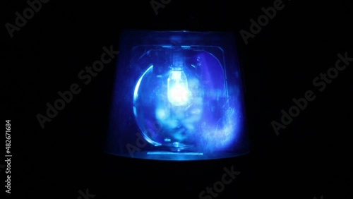 Blue flashing warning light / siren - Emergency services, Ambulance, Paramedic, Police rotating Beacon photo