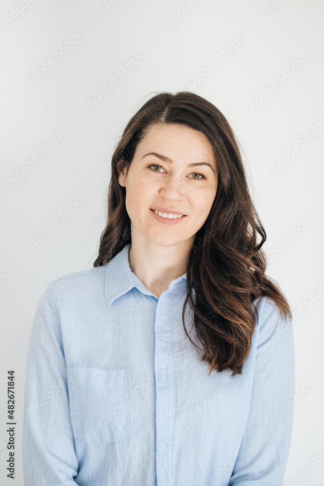 Woman wearing blue shirt and smiling. Job advertisement for young people. job announcement. Woman wearing blue shirt and smiling. Job advertisement for young people. job announcement.