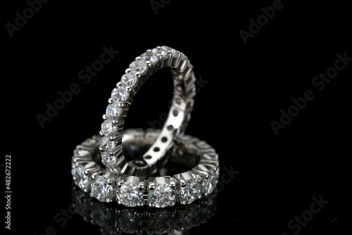 Diamond jewelry. Diamond rings on black background