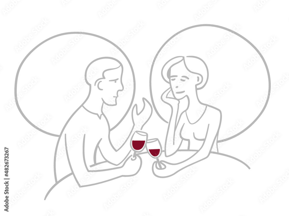 Romantic couple sitting in restaurant drinking wine and having a conversation. Romantic couple sitting in restaurant drinking wine and having a conversation.