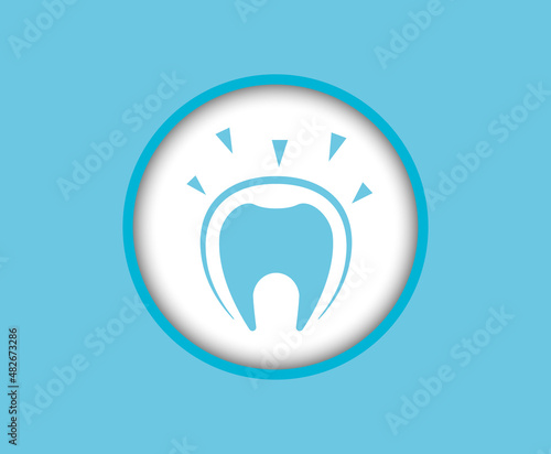 The tooth icon, in a protective shell from the effects of external factors, placed on a white background. Dental treatment.