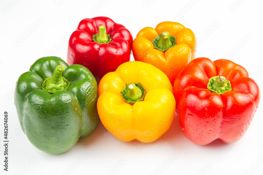 colored bell peppers on a white background. vitamin food colored bell peppers on a white background. vitamin food