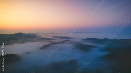 Beautiful arial landscape of  amazing mountain in fog.