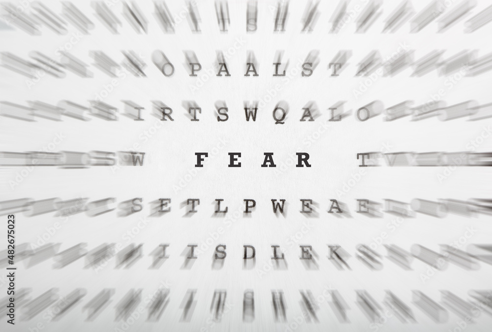 Fototapeta premium Word Fear in crossword letters with motion focus effect