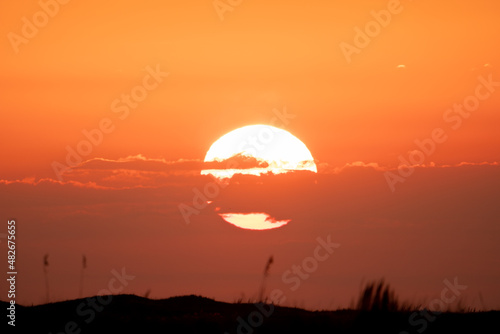 Solar flare storm the sun is a mass of incandescent gas, a gigantic nuclear furnace where hydrogen is built into helium at a temperature millions of degrees, atom smashing machine views at sunrise photo