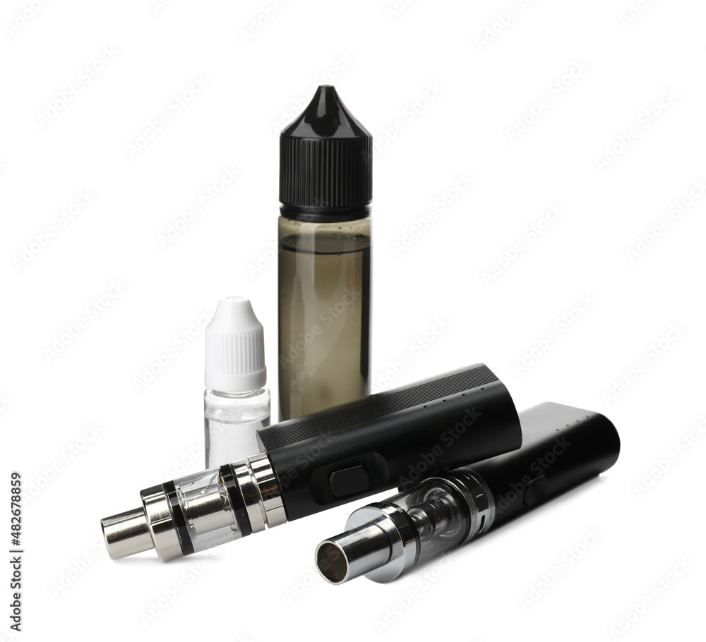 Electronic smoking devices and vaping liquid on white background Electronic smoking devices and vaping liquid on white background