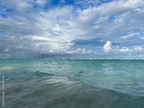 ocean shore against the background of the sky with clouds