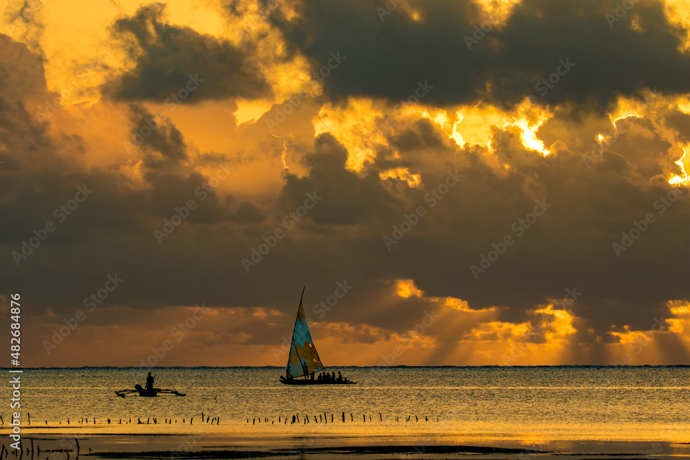 A traditional native nagalawa at sunrise. The ngalawa or ungalawa is a