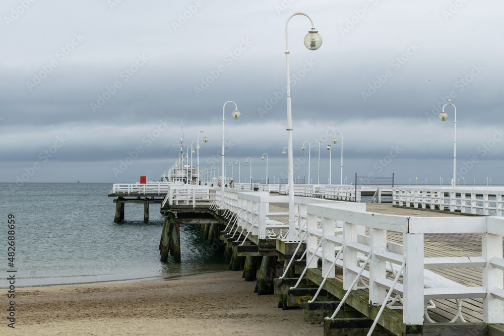 Naklejka premium Old wooden pier in Sopot, Baltic Sea coast