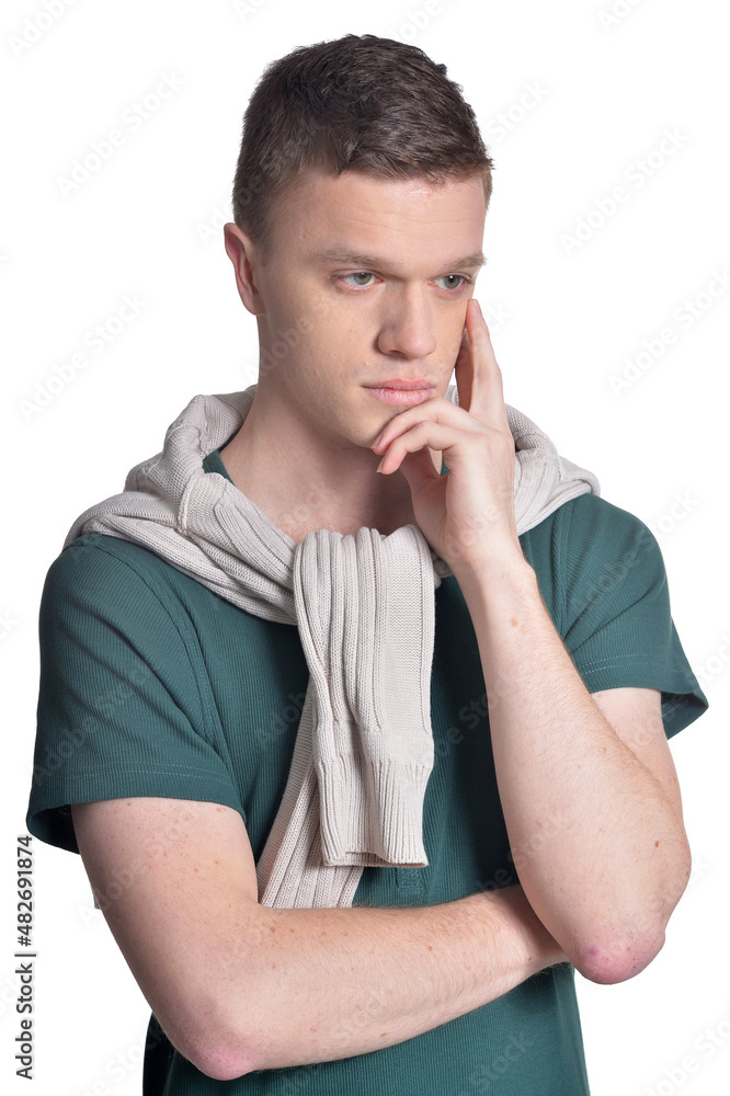 Portrait of handsome thinking man isolated on white background
