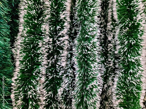 фотографія Christmas decorations green tinsel, frippery