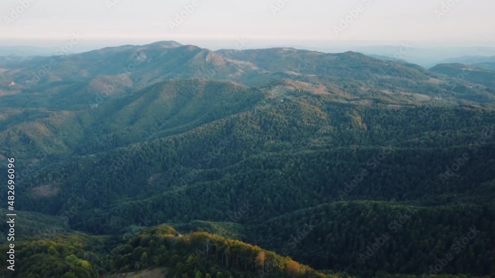 Aerial drone view of countryside hilly landscape in autumn colors. Aerial drone view of countryside hilly landscape in autumn colors.
